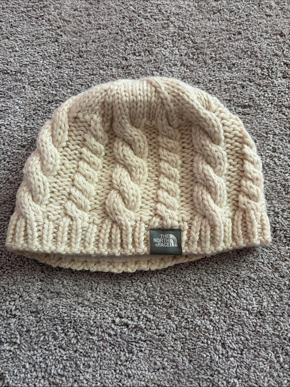 The North Face Cable Knit Beanie in Cream